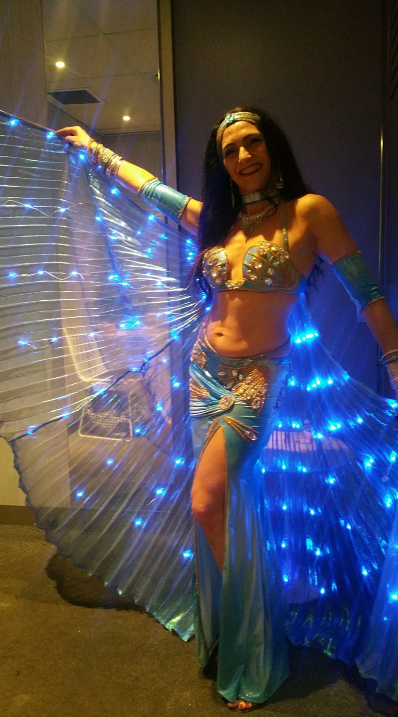 Hire a Bellydancer with beautiful LED wings for your next event!